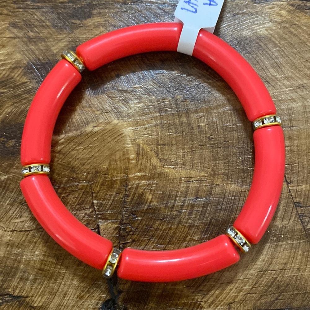 NWT handmade light red acrylic tube bracelet with gold rhinestone pave’